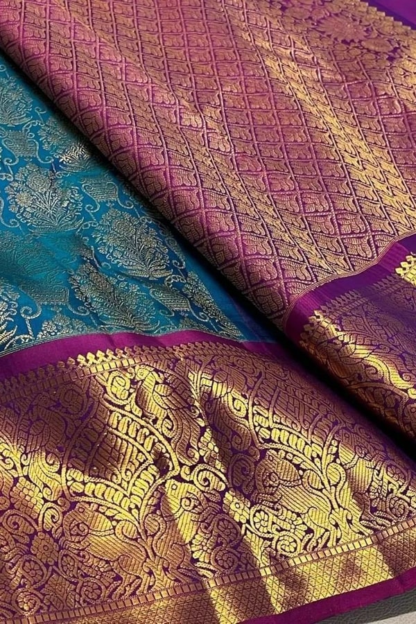 Contrast Border Banarasi Soft Silk Saree with Jacquard Zari Brocade in Teal and Purple  in Surat