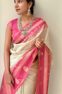 Cream Banarasi Soft Silk Saree with Contrast Green or Pink Zari Border and Pallu  in Surat