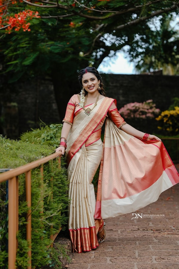 Cream Banarasi Soft Silk Saree with Coral Red Border and Kerala Style Contrast Pallu  in Surat