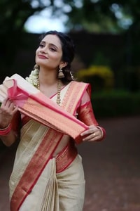Cream Banarasi Soft Silk Saree with Coral Red Border and Kerala Style Contrast Pallu  in Surat video 1