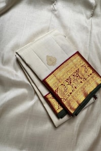 Cream Banarasi Soft Silk Saree with Gold Leaf Buttas and Maroon Zari Border and Pallu  in Surat