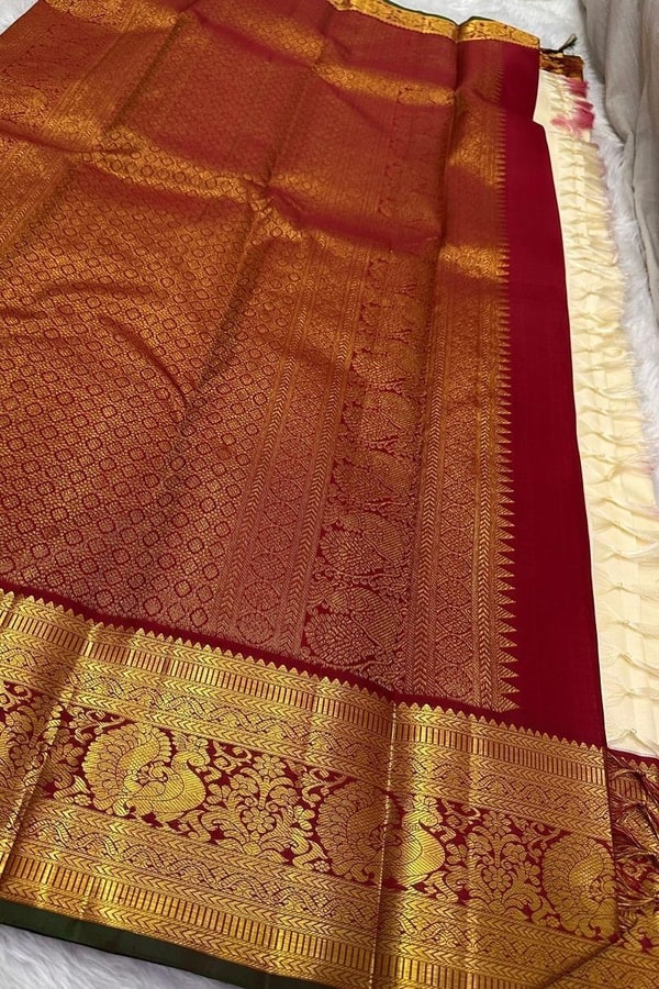 Cream Banarasi Soft Silk Saree with Gold Leaf Buttas and Maroon Zari Border and Pallu  in Surat