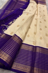 Cream Banarasi Soft Silk Saree with Gold Leaf Buttas and Wide Violet Zari Striped Border  in Surat