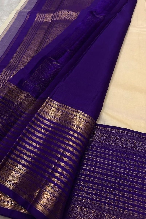 Cream Banarasi Soft Silk Saree with Gold Leaf Buttas and Wide Violet Zari Striped Border  in Surat