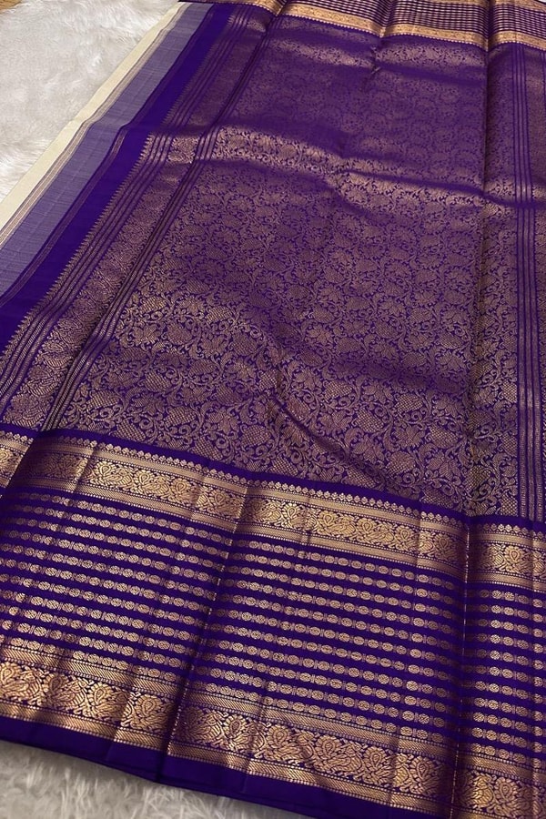 Cream Banarasi Soft Silk Saree with Gold Leaf Buttas and Wide Violet Zari Striped Border  in Surat