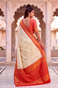 Cream Banarasi Soft Silk Saree with Gold Zari Buttas and Contrast Maroon Zari Border  in Surat