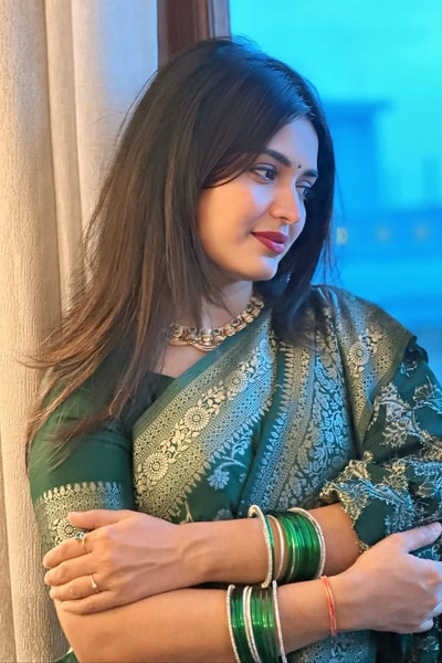 Dark Green Banarasi Soft Silk Saree with All-Over Silver Zari Floral Jaal in Surat