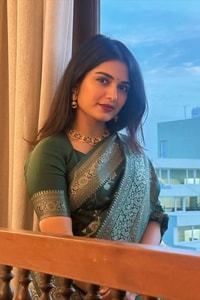 Dark Green Banarasi Soft Silk Saree with All-Over Silver Zari Floral Jaal  in Surat