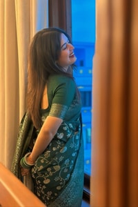 Dark Green Banarasi Soft Silk Saree with All-Over Silver Zari Floral Jaal  in Surat
