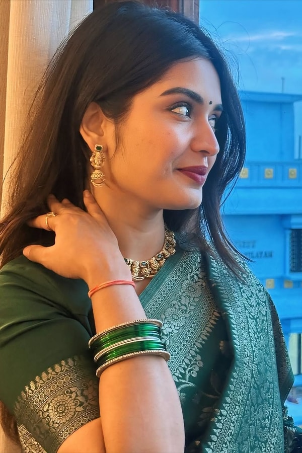 Dark Green Banarasi Soft Silk Saree with All-Over Silver Zari Floral Jaal  in Surat