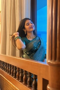 Dark Green Banarasi Soft Silk Saree with All-Over Silver Zari Floral Jaal  in Surat