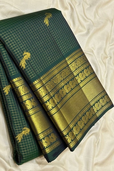 Dark Green Banarasi Soft Silk Saree with Textured Body, Small Zari Buttas and Checked Border in Surat