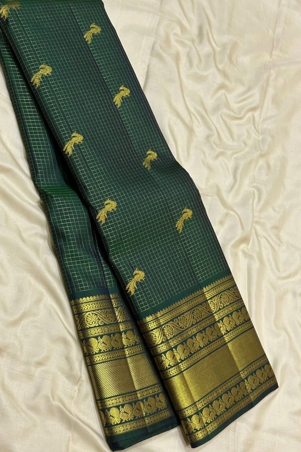 Dark Green Banarasi Soft Silk Saree with Textured Body, Small Zari Buttas and Checked Border  in Surat