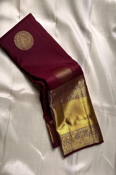 Dark Maroon Banarasi Soft Silk Saree with Sparse Zari Chakra Buttas and Grand Gold Border in Surat