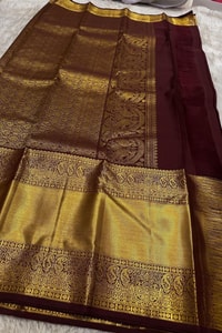 Dark Maroon Banarasi Soft Silk Saree with Sparse Zari Chakra Buttas and Grand Gold Border  in Surat