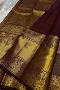 Dark Maroon Banarasi Soft Silk Saree with Sparse Zari Chakra Buttas and Grand Gold Border  in Surat