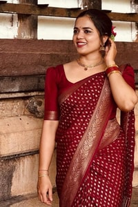 Deep Maroon Banarasi Soft Silk Saree with All-Over Gold Zari Buttis and Gold Border  in Surat