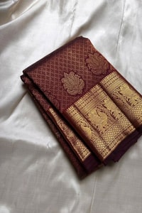Deep Maroon Banarasi Soft Silk Saree with Zari Lattice, Floral Buttas and Annam Border  in Surat