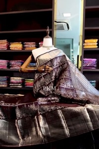 Deep Plum Banarasi Soft Silk Saree with Heavy Silver Zari Floral Weave and Grand Pallu  in Surat