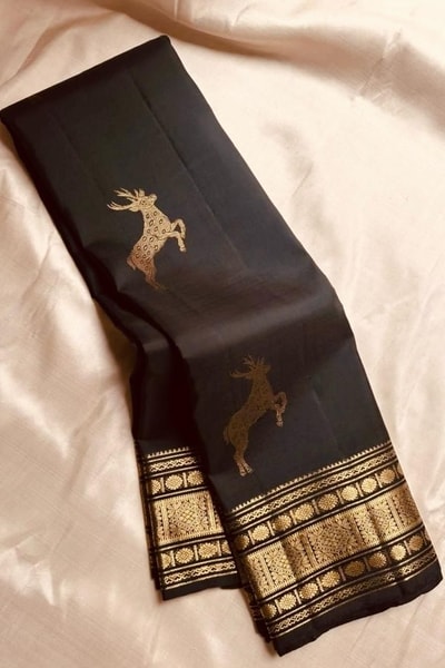 Deer Motif Banarasi Soft Silk Saree with Gold Zari Border in Black, Blue, Red and Wine in Surat