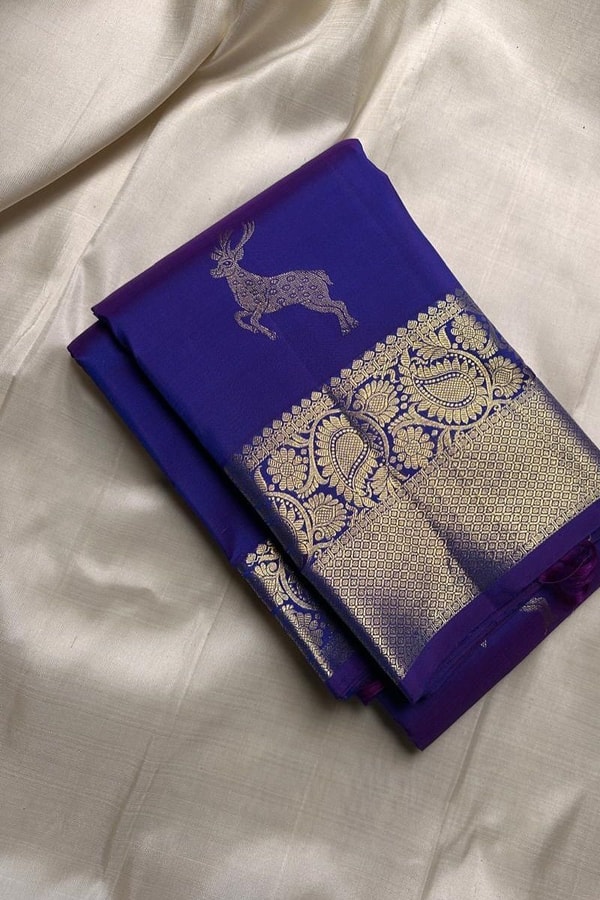 Deer Motif Banarasi Soft Silk Saree with Gold Zari Border in Black, Blue, Red and Wine  in Surat