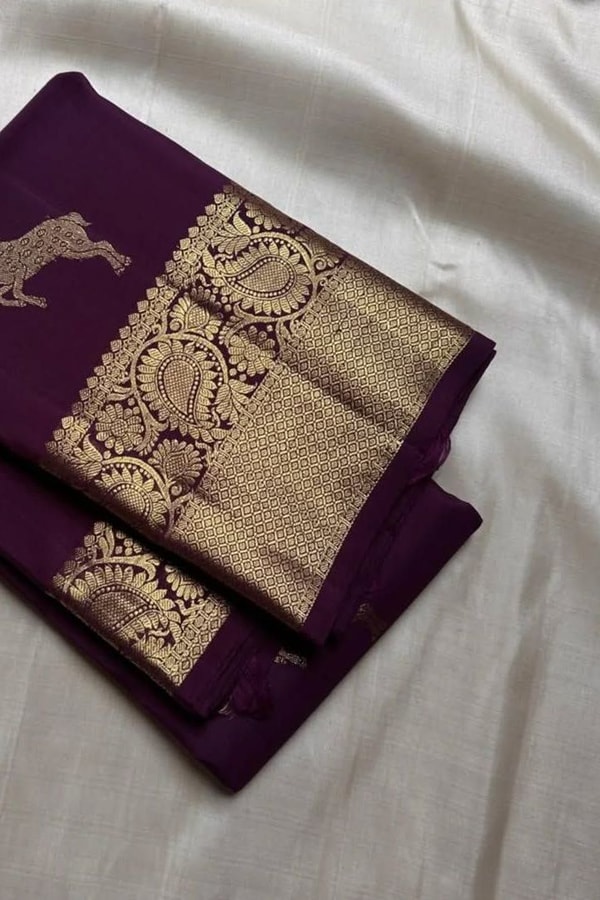 Deer Motif Banarasi Soft Silk Saree with Gold Zari Border in Black, Blue, Red and Wine  in Surat