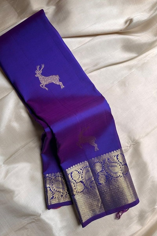 Deer Motif Banarasi Soft Silk Saree with Gold Zari Border in Black, Blue, Red and Wine  in Surat