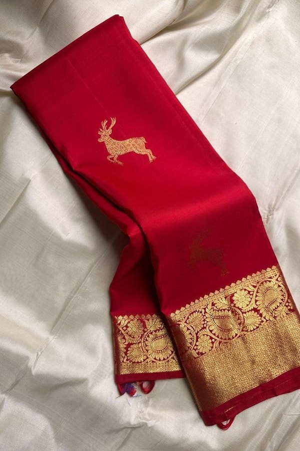 Deer Motif Banarasi Soft Silk Saree with Gold Zari Border in Black, Blue, Red and Wine  in Surat