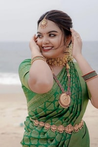 Emerald Green Banarasi Soft Silk Saree with Gold Zari Buttas and Rich Gold Zari Border  in Surat