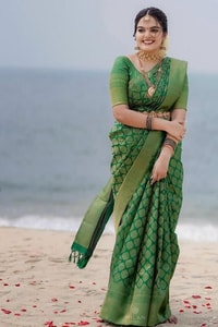 Emerald Green Banarasi Soft Silk Saree with Gold Zari Buttas and Rich Gold Zari Border  in Surat
