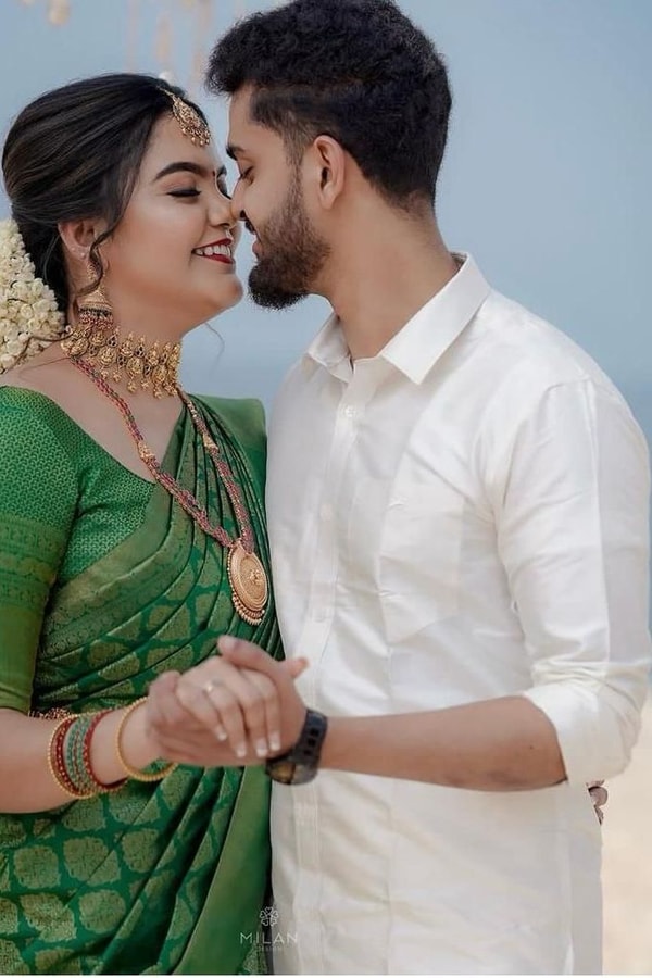 Emerald Green Banarasi Soft Silk Saree with Gold Zari Buttas and Rich Gold Zari Border  in Surat