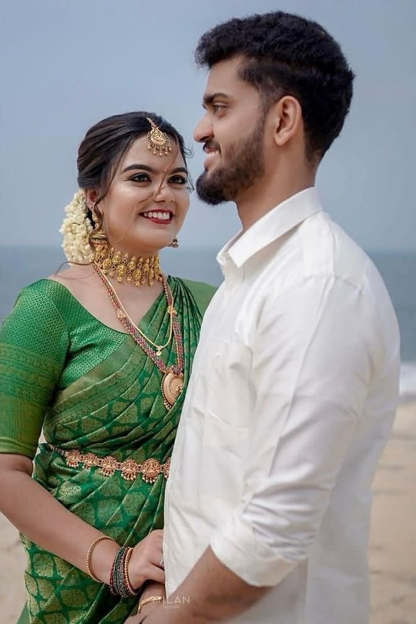 Emerald Green Banarasi Soft Silk Saree with Gold Zari Buttas and Rich Gold Zari Border  in Surat