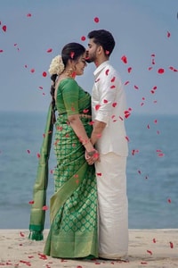 Emerald Green Banarasi Soft Silk Saree with Gold Zari Buttas and Rich Gold Zari Border  in Surat