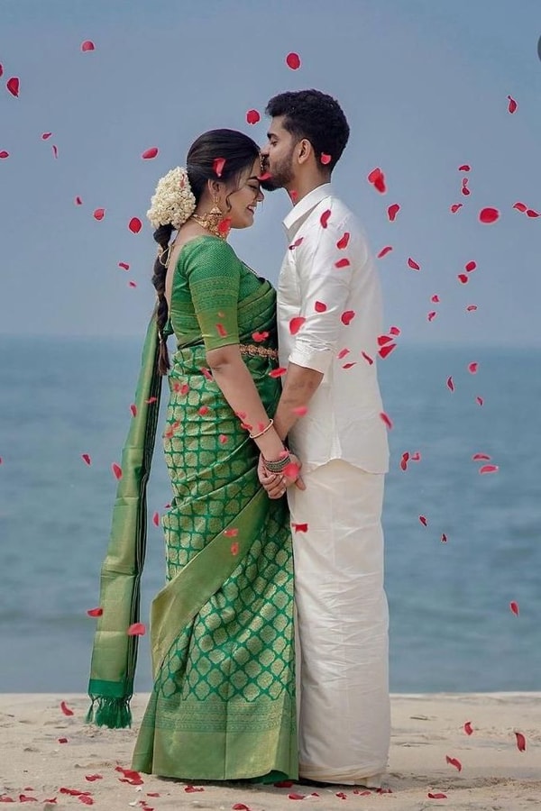 Emerald Green Banarasi Soft Silk Saree with Gold Zari Buttas and Rich Gold Zari Border  in Surat