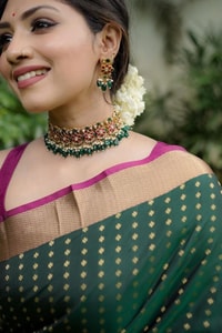 Emerald Green Banarasi Soft Silk Saree with Gold Zari Buttis and Peach Pink Woven Border  in Surat