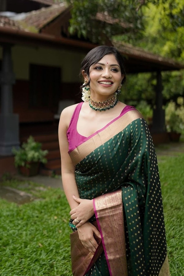 Emerald Green Banarasi Soft Silk Saree with Gold Zari Buttis and Peach Pink Woven Border  in Surat