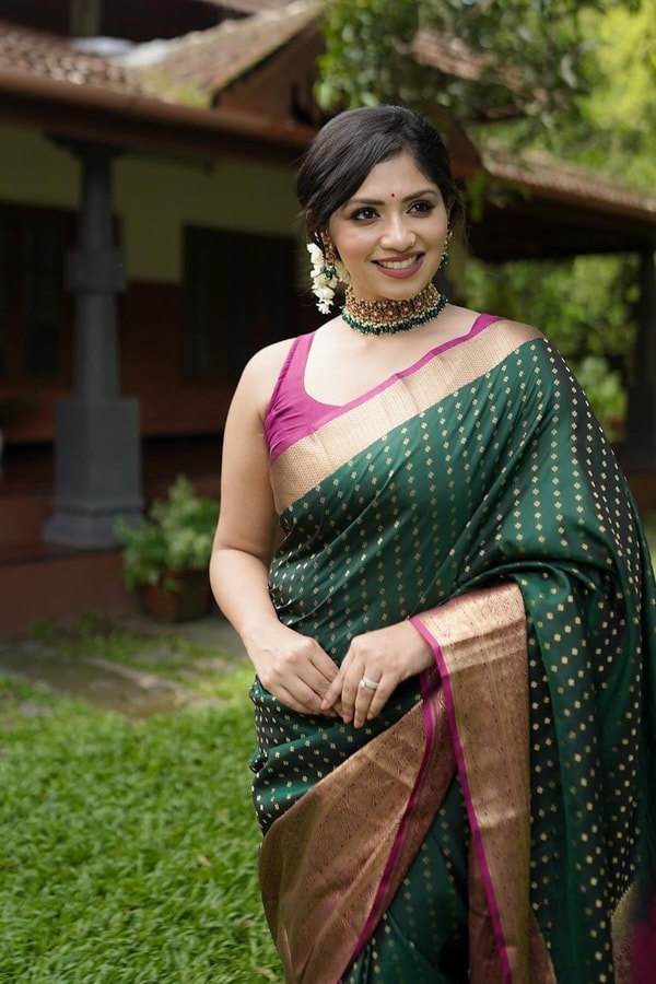 Emerald Green Banarasi Soft Silk Saree with Gold Zari Buttis and Peach Pink Woven Border  in Surat