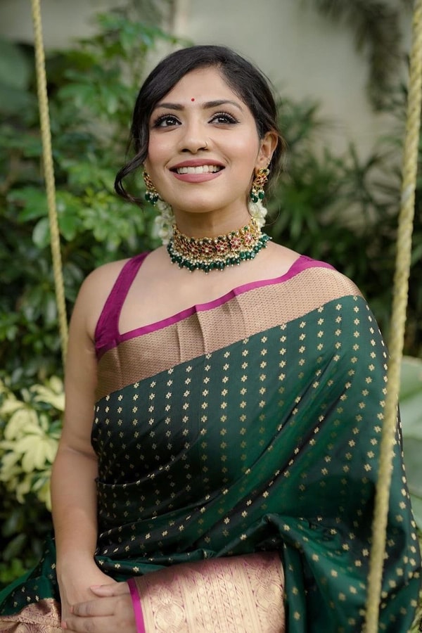 Emerald Green Banarasi Soft Silk Saree with Gold Zari Buttis and Peach Pink Woven Border  in Surat