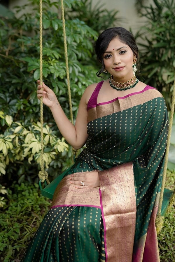 Emerald Green Banarasi Soft Silk Saree with Gold Zari Buttis and Peach Pink Woven Border  in Surat