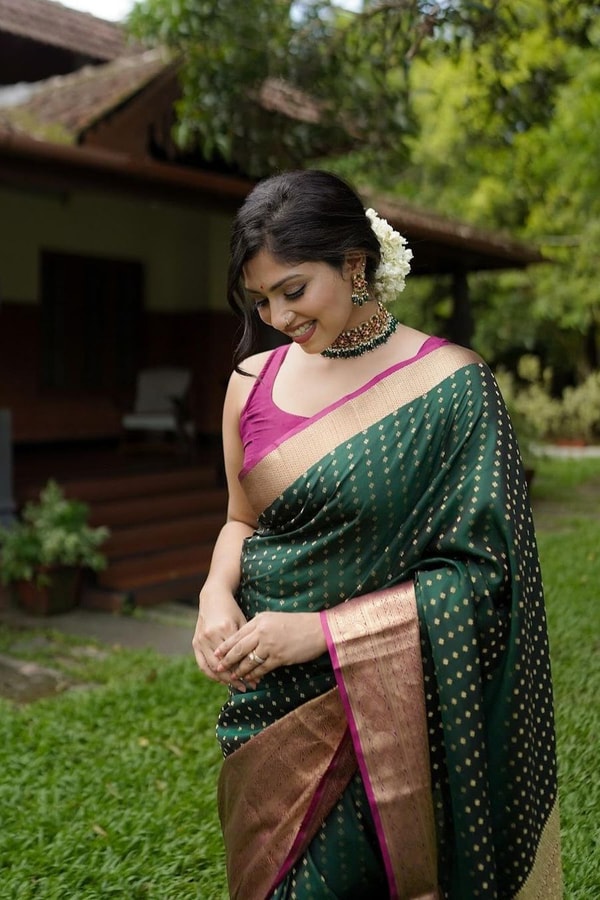 Emerald Green Banarasi Soft Silk Saree with Gold Zari Buttis and Peach Pink Woven Border  in Surat