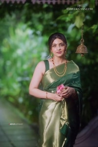 Emerald Green Banarasi Soft Silk Saree with Tiny Gold Zari Buttis and Shimmering Gold Pallu  in Surat