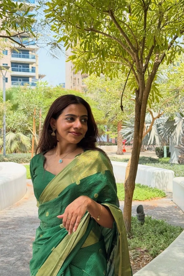 Emerald Green Banarasi Soft Silk Saree with Tiny Gold Zari Buttis and Shimmering Gold Pallu  in Surat