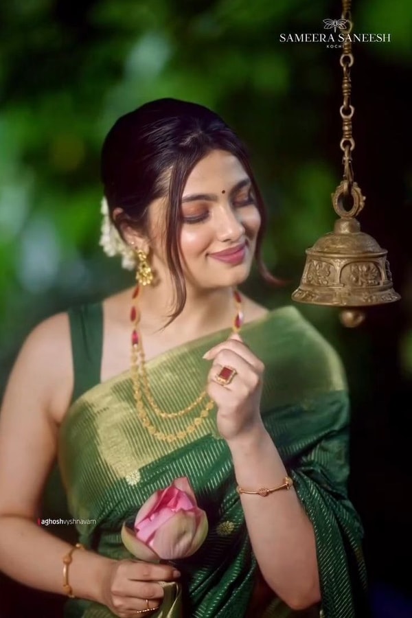 Emerald Green Banarasi Soft Silk Saree with Tiny Gold Zari Buttis and Shimmering Gold Pallu  in Surat