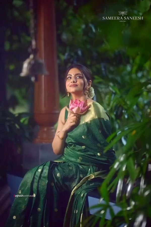Emerald Green Banarasi Soft Silk Saree with Tiny Gold Zari Buttis and Shimmering Gold Pallu  in Surat
