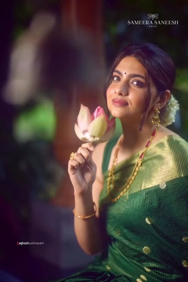 Emerald Green Banarasi Soft Silk Saree with Tiny Gold Zari Buttis and Shimmering Gold Pallu  in Surat