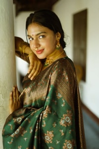 Floral Weave Banarasi Soft Silk Saree with Gold and Copper Zari in Blue, Cream and Green  in Surat