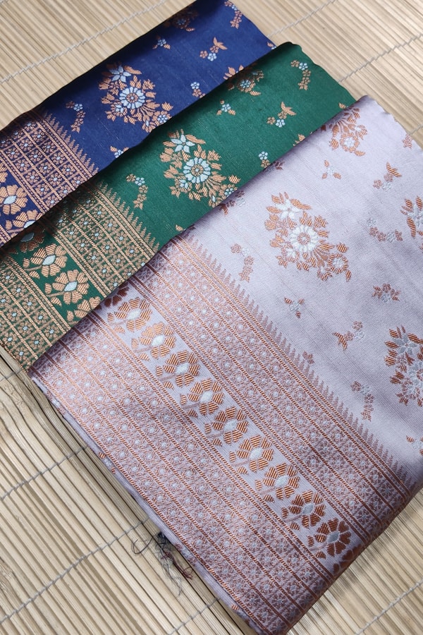 Floral Weave Banarasi Soft Silk Saree with Gold and Copper Zari in Blue, Cream and Green  in Surat