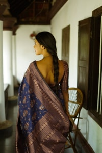 Floral Weave Banarasi Soft Silk Saree with Gold and Copper Zari in Blue, Cream and Green  in Surat