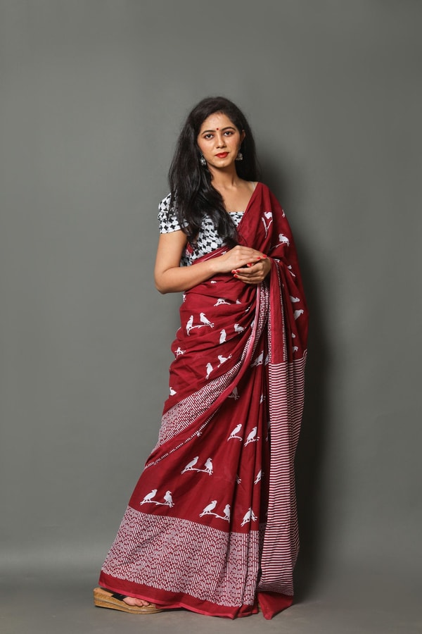 Flying Bird Motif Saree with Striped Pallu in Maroon, Orange and Charcoal Grey  in Surat