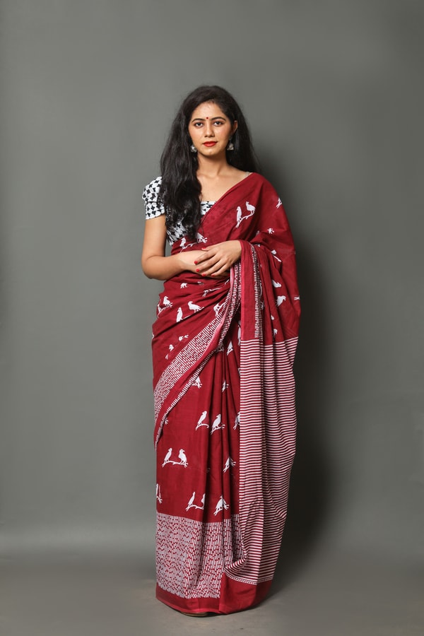 Flying Bird Motif Saree with Striped Pallu in Maroon, Orange and Charcoal Grey  in Surat